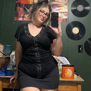 Black Y2K blouse with floral lace detailing going down front middle.